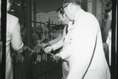 1976 Frank Wheaton, Jr. cutting the glass chain at the Grand Opening.