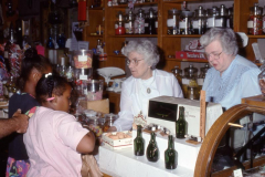 1993 School Tour in the General Store  with Rose Mary Boyle and Charlotte Hoover (L to R)