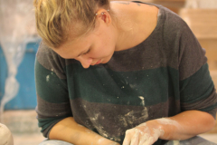 2014 Lauren Wymbs demonstrating in the Pottery during the Festival of Fine Craft