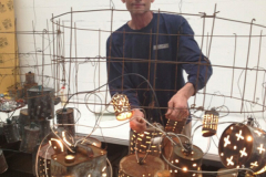 2013 Glass Studio Creative Director, Hank Adams, with lighting installation