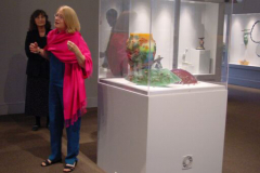 2005 Exhibition curator Susanne Frantz speaking at the opening of the "Particle Theories: International Pate de Verre and other Cast Glass Granulations" Exhibit with museum director Gay LeClaire Taylor