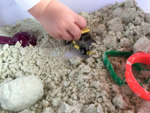 Toy truck in sand enlarged image