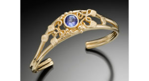 Gold Ring With Purple Stone by Mary Kay Donnelly