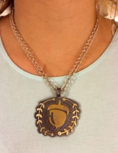 Metalsmith Necklace with Acorn in the center