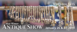 Mid-Winter Antique Show at WheatonArts on January 26 & 27, 2019. With image of antique silverware tongs hanging on a display case.