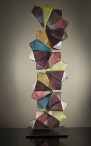 “Variegated Fractal Tower” Geo15-05, by Richard Royal. 53 x 17 x 11 inches blown and sandblasted glass with metal stand