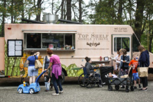 Top Shelf Mobile Cuisine truck serving visitors to the Summer Antique and food market at wheatonarts