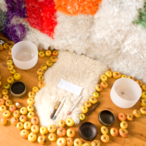 Setup of singing bowls and a recycled glass display for Guided Meditation & Sound Bath Performances with Creative Glass Fellow Sarah Max Beck