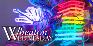 Wheaton Wednesday banner with image of a neon lights resembling a rainbow.