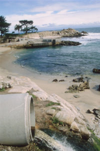 A pipe empties urban runoff on a California beach Monterey Bay National Marine Sanctuary, National Oceanic and Atmospheric Administration