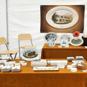 A booth showcasing the painted porcelain of Michelle Post