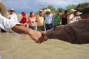 Americans and Mexicans join hands across the Rio Grande, 2014 Lorne Matalon