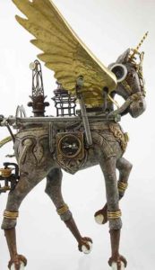 A found object piece by Larry Agnello of a horse with wings and mechanical parts