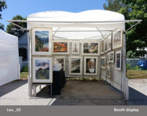 A booth showcasing the photography of Michael Leu.