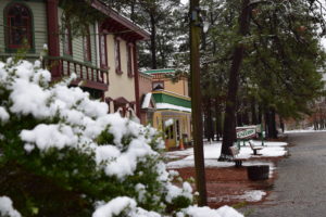 A photo of light snow on the WheatonArts campus new the Gallery of Fine Craft.