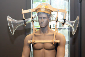 Allan Wexler, Hear, artwork shown on a grey mannequin.