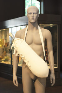 Allan Wexler, Cradle, artwork shown on a grey mannequin.