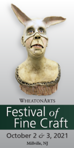 A vertical banner for the WheatonArts Festival of Fine Craft on October 2 & 3, 2021. An image of a sculpted man in a rabbit mask by Jeanine Pennell sits on top of the text.