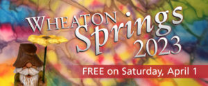 "Wheaton Springs 2023" is displayed in large white text across a multicolor spiral image. "FREE on Saturday, April 1" is displayed at the bottom of the image to the right of a wood-carved gnome by local artist Domenick Maggio.