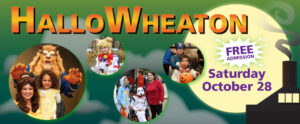 Image of the banner for HalloWheaton. "HalloWheaton" is written in orange and yellow gradient letters across the top of the banner. The background of the banner is a dark green to light green gradient with gray clouds and a large full moon on the right side of the banner. In the bottom right corner is a dark gray cartoon version of the WheatonArts Glass Studio. The Glass Studio has three rectangular windows and a chimney releasing a curly stream of smoke up towards the top of the banner. The banner features four circular photos with light green shadows. The photos feature children and their families dressed up in costumes for the event. Costumes include characters from Beauty and the Beast, Sailor Moon, My Little Pony, Star Wars, and Captain America. One child is also holding an orange jack-o-lantern candy basket for trick-or-treating.