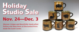 Image of a banner for the Holiday Studio Sale. The background of the banner is dark gray at the top but gets lighter as it reaches the bottom corners. The bottom left corner is a lighter gray, but the bottom right corner has faded to white. The left side of the banner has large white text with a red shadow that reads "Holiday Studio Sale". Underneath is large red text with a white shadow that reads "Nov. 24-Dec. 3". Below that is smaller red text that reads "Discover Unique and Beautifully Handcrafted Pottery and Glass Items at Discounted Prices Inside the Event Center." The right side of the banner features six clay mugs stacked in a pyramid formation. Each mug has a black stripe around the bottom and a cream-colored stripe around the top. The rest of the mugs are light brown with small black speckles and black handles. Each mug features a black silhouette of an animal. The bottom three mugs, from left to right, feature a cow, a sitting rabbit, and a pig. The middle two mugs feature a rabbit on all fours and a sheep. The top mug features a pig as well.