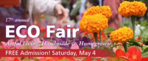 Banner for Eco Fair. The banner has a floral background with four prominent orange flowers on the right side of the banner. Behind the flowers is a blurred crowd. On the left side of the image is white text that reads "17th annual" above "Eco Fair". Underneath "Eco Fair" is more white text that reads "Artful Living, Handmade & Homegrown". Starting at the left side of the banner is a red rectangle that fades as it reaches the right side of the banner. Within this rectangle is white text that reads "Free Admission! Saturday, May 4".