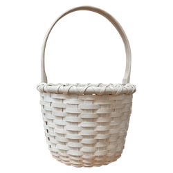 Image of a white woven handle basket in front of a white background.