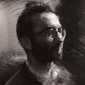 Grayscale side profile portrait photo of Andrew Bearnot. Andrew has short hair, glasses, and facial hair. The image has a wavy streak effect to it.